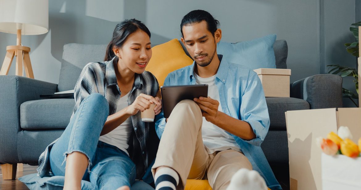 happy-asian-young-couple-man-woman-use-tablet-online-shopping-furniture-decorate-house-with-carton-packages-new-house happy-asian-young-couple-man-woman-use-tablet-online-shopping-furniture-decorate-house-with-carton-packages-new-house